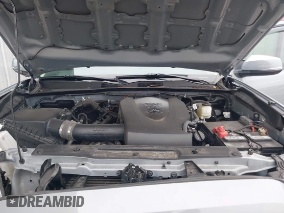 2021 Toyota Tacoma SR z VIN 5TFCZ5AN5MX281428, wystawiony jako IAAI lot #41893437 z przebiegiem 36 204 mil mil oraz . Historia ofert i sprzedaży dostępna na DreamBid. Obrazek 10.