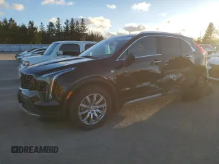 2022 Cadillac XT4 AWD Premium Luxury with VIN 1GYFZDR45NF109999, listed as a Copart auction lot 84618914 with 66,697 mi miles and Clean title. Bid and sale history available at DreamBid. Image 1.