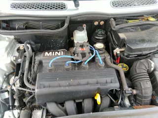 2002 MINI Hardtop with VIN WMWRC33432TE10226, listed as a IAAI auction lot 41973956 with 156,445 mi miles and . Bid and sale history available at DreamBid. Image 10.