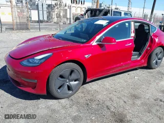 2018 Tesla Model 3 Long Range Battery with VIN 5YJ3E1EA6JF022061, listed as a IAAI auction lot 41602320 with 131,653 mi miles. Bid and sale history available at carsss.com. Image 17.