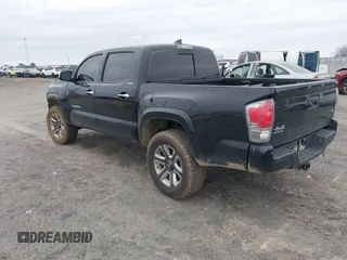 2018 Toyota Tacoma SR with VIN 3TMGZ5AN5JM159932, listed as a IAAI auction lot 41731655 with 138,780 mi miles. Bid and sale history available at carsss.com. Image 3.