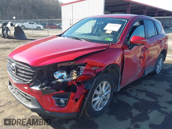 2016 Mazda CX-5 Touring with VIN JM3KE4CY4G0860035, listed as a IAAI auction lot 41678299 with 72,101 mi miles. Bid and sale history available at carsss.com. Image 17.