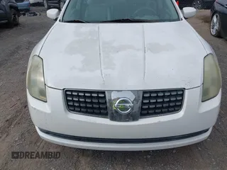 2004 Nissan Maxima SE with VIN 1N4BA41E74C895097, listed as a IAAI auction lot 42485748 with 112,443 mi miles and . Bid and sale history available at DreamBid. Image 6.