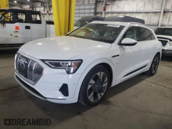 2021 Audi e-tron Prestige with VIN WA1VABGEXMB001869, listed as a Copart auction lot 52728573 with 26,110 mi miles and . Bid and sale history available at DreamBid. Image 1.