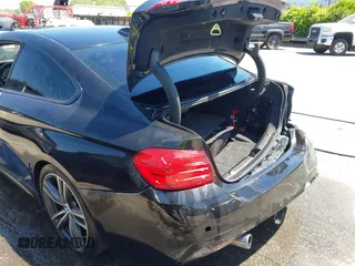 2015 BMW 4 Series 435i with VIN WBA3R1C56FK194060, listed as a IAAI auction lot 42061619 with 153,384 mi miles and . Bid and sale history available at DreamBid. Image 18.