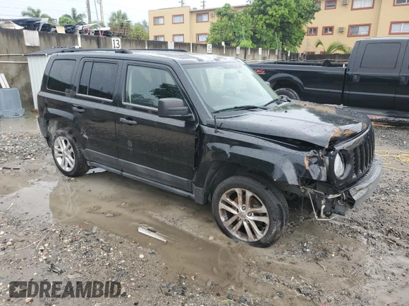 2011 Jeep Patriot Sport with VIN 1J4NT1GA8BD102704, listed as a Copart auction lot 58920445 with 125,817 mi miles and Salvage title. Bid and sale history available at DreamBid. Image 4.
