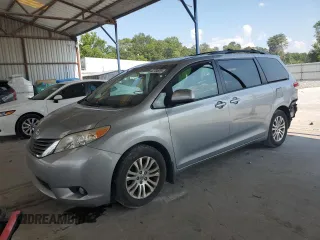 2014 Toyota Sienna XLE с VIN 5TDYK3DC4ES507619, выставлен на аукционе Copart как лот 62784915 с пробегом 152 830 миль миль и Списание • Salvage title. История ставок и продаж доступна на DreamBid. Изображение 1.