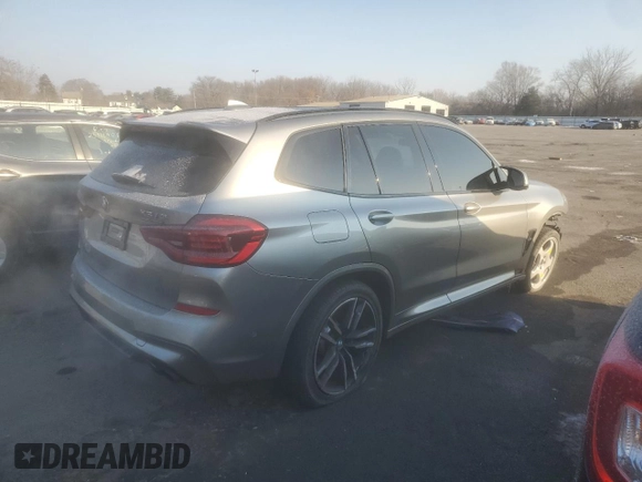 2021 BMW X3 M with VIN 5YMTS0C08M9F26343, listed as a Copart auction lot 88410035 with 52,596 mi miles and Salvage Title. Bid and sale history available at carsss.com. Image 3.