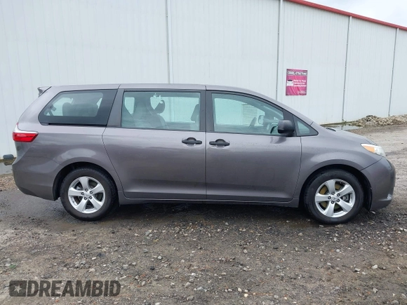 2015 Toyota Sienna L with VIN 5TDZK3DC8FS678539, listed as a IAAI auction lot 42115498 with 111,417 mi miles and . Bid and sale history available at DreamBid. Image 13.