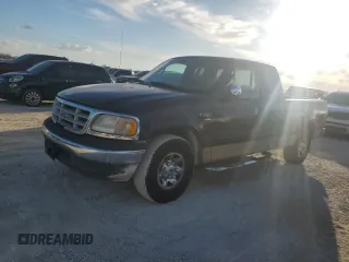 1999 Ford F-250 with VIN 1FTRX27L8XNB35593, listed as a Copart auction lot 77008354 with Not provided miles and Salvage title. Bid and sale history available at DreamBid. Image 1.