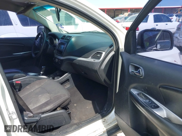 2013 Dodge Journey American Value with VIN 3C4PDCAB0DT723988, listed as a IAAI auction lot 42263191 with 205,014 mi miles and . Bid and sale history available at DreamBid. Image 5.