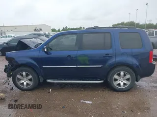 2013 Honda Pilot Touring with VIN 5FNYF4H95DB007125, listed as a IAAI auction lot 42493693 with Not provided miles and . Bid and sale history available at DreamBid. Image 14.