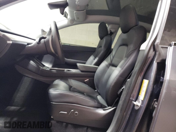 2021 Tesla Model Y Performance with VIN 5YJYGDEF2MF134700, listed as a Copart auction lot 56325685 with 66,730 mi miles and Salvage Title. Bid and sale history available at DreamBid. Image 7.