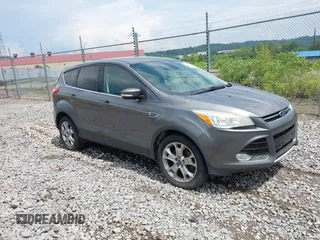 2013 Ford Escape SEL with VIN 1FMCU9H98DUA29863, listed as a IAAI auction lot 42621464 with 146,204 mi miles and . Bid and sale history available at DreamBid. Image 1.