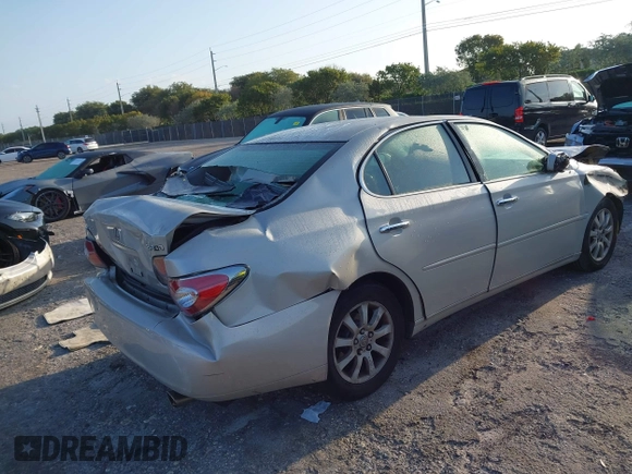 2003 Lexus ES with VIN JTHBF30G730134027, listed as a IAAI auction lot 42016954 with 99,751 mi miles. Bid and sale history available at carsss.com. Image 4.