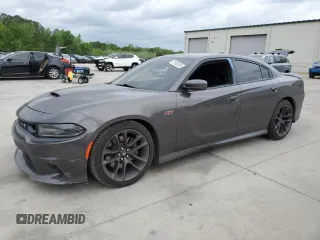2020 Dodge Charger Scat Pack Widebody z VIN 2C3CDXGJ4LH153364, wystawiony jako Copart lot #51962505 z przebiegiem 106 231 mil mil oraz Czysty tytuł • Clean title. Historia ofert i sprzedaży dostępna na DreamBid. Obrazek 1.