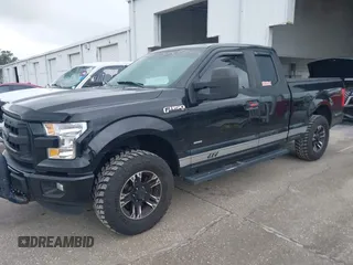 2015 Ford F-150 XLT with VIN 1FTEX1EP2FFC73234, listed as a IAAI auction lot 41661655 with 150,371 mi miles. Bid and sale history available at carsss.com. Image 17.