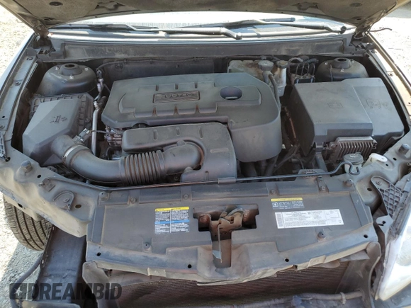 2006 Pontiac G6 1SV z VIN 1G2ZF55BX64225352, wystawiony jako Copart lot #57915805 z przebiegiem 194 400 mil mil oraz Szkoda całkowita • Salvage title. Historia ofert i sprzedaży dostępna na DreamBid. Obrazek 11.
