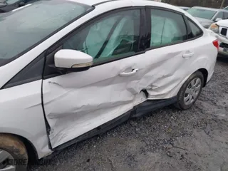 2014 Ford Focus SE with VIN 1FADP3F23EL351732, listed as a IAAI auction lot 41548067 with 109,379 mi miles. Bid and sale history available at carsss.com. Image 6.