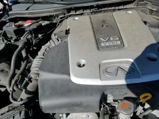 2015 Infiniti Q50 Premium z VIN JN1BV7AR8FM412266, wystawiony jako Copart lot #82639974 z przebiegiem 67 377 mil mil oraz Szkoda całkowita • Salvage title. Historia ofert i sprzedaży dostępna na DreamBid. Obrazek 14.