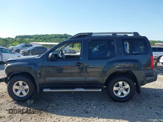 2013 Nissan Xterra S z VIN 5N1AN0NW7DN816369, wystawiony jako IAAI lot #42296551 z przebiegiem 150 551 mil mil oraz . Historia ofert i sprzedaży dostępna na DreamBid. Obrazek 14.