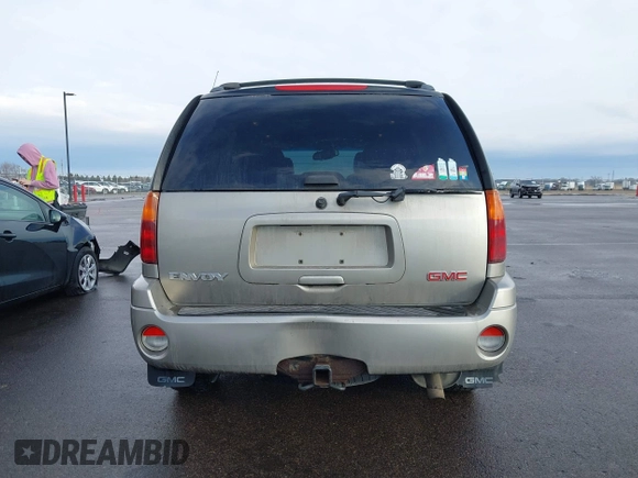2003 GMC Envoy SLT with VIN 1GKDT13S532308502, listed as a IAAI auction lot 41676188 with 218,626 mi miles. Bid and sale history available at carsss.com. Image 16.