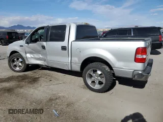 2005 Ford F-150 XLT with VIN 1FTRW12W35KC32505, listed as a Copart auction lot 54786525 with 149,614 mi miles and Salvage title. Bid and sale history available at DreamBid. Image 2.