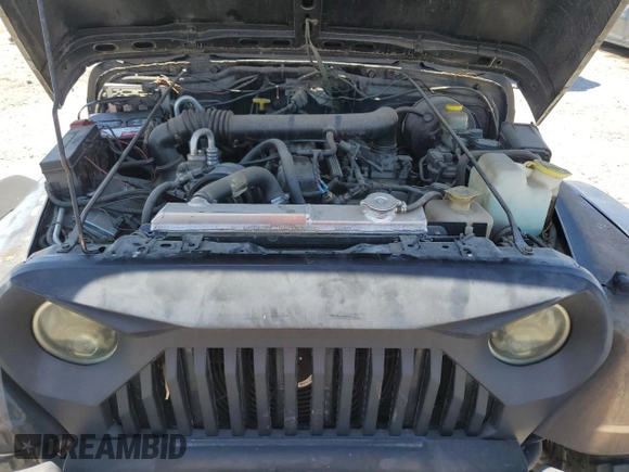 1999 Jeep Wrangler Sahara with VIN 1J4FY49S8XP472733, listed as a Copart auction lot 58174915 with 170,838 mi miles and Salvage title. Bid and sale history available at DreamBid. Image 12.