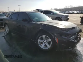 2015 Dodge Charger SE with VIN 2C3CDXBG2FH795792, listed as a Copart auction lot 51297775 with 115,690 mi miles and Salvage Title. Bid and sale history available at DreamBid. Image 4.