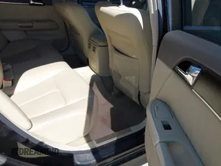 2010 Infiniti M with VIN JN1CY0AR6AM961914, listed as a IAAI auction lot 42055435 with 133,435 mi miles. Bid and sale history available at carsss.com. Image 8.
