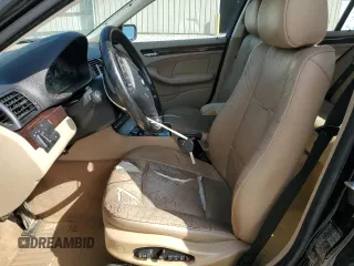 2004 BMW 3 Series 325xi with VIN WBAEU33404PR08565, listed as a Copart auction lot 57865215 with 253,784 mi miles and Salvage title. Bid and sale history available at DreamBid. Image 7.