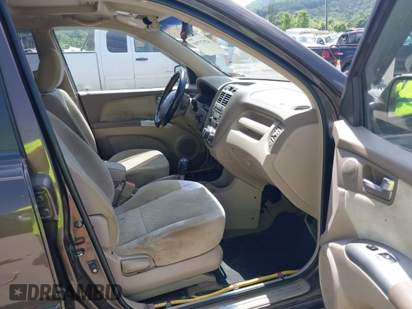 2005 Kia Sportage LX with VIN KNDJE723957075445, listed as a IAAI auction lot 42573760 with 185,000 mi miles and . Bid and sale history available at DreamBid. Image 5.