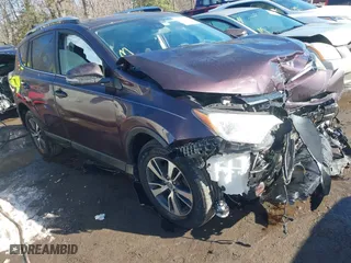 2016 Toyota RAV4 XLE with VIN 2T3RFREV2GW523265, listed as a IAAI auction lot 41332754 with 107,072 mi miles. Bid and sale history available at carsss.com. Image 1.
