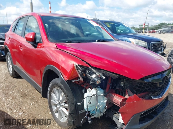2015 Mazda CX-5 Sport with VIN JM3KE2BE8F0451014, listed as a IAAI auction lot 42536333 with 131,059 mi miles and . Bid and sale history available at DreamBid. Image 1.