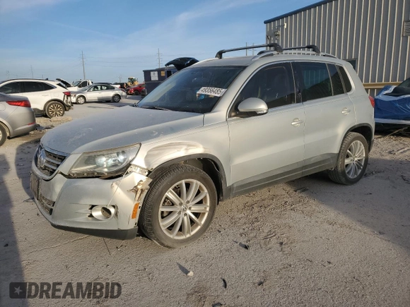2011 Volkswagen Tiguan SEL w/Premium Navi with VIN WVGAV7AX8BW542758, listed as a Copart auction lot 49356485 with 77,958 mi miles and Salvage Title. Bid and sale history available at DreamBid. Image 1.
