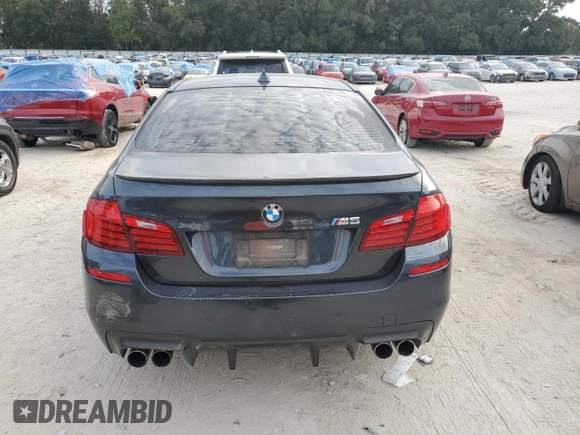 2016 BMW M5 z VIN WBSFV9C51GD595430, wystawiony jako Copart lot #79675834 z przebiegiem 82 351 mil mil oraz Szkoda całkowita • Salvage title. Historia ofert i sprzedaży dostępna na DreamBid. Obrazek 6.