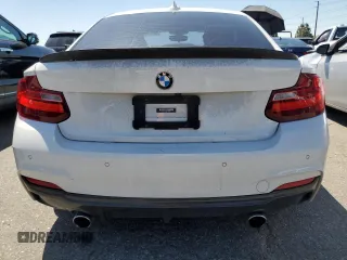 2015 BMW 2 Series 228i with VIN WBA1F9C53FVW98367, listed as a Copart auction lot 50378584 with 74,661 mi miles and Salvage Title. Bid and sale history available at carsss.com. Image 6.