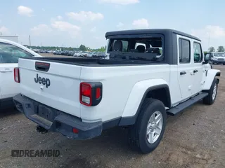 2023 Jeep Gladiator Sport S with VIN 1C6HJTAG3PL532694, listed as a IAAI auction lot 42446863 with 40,525 mi miles and . Bid and sale history available at DreamBid. Image 4.