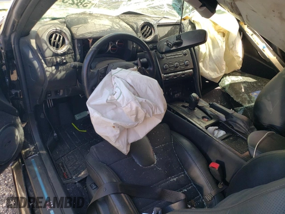 2012 Nissan GT-R Premium z VIN JN1AR5EFXCM250365, wystawiony jako Copart lot #58251554 z przebiegiem Nie podano mil oraz Szkoda całkowita • Salvage title. Historia ofert i sprzedaży dostępna na DreamBid. Obrazek 8.