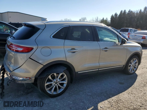 2015 Lincoln MKC with VIN 5LMTJ2AH0FUJ19784, listed as a Copart auction lot 51112455 with 72,123 mi miles and Salvage Title. Bid and sale history available at DreamBid. Image 3.