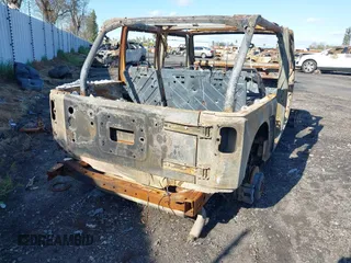 2014 Jeep Wrangler Unlimited Rubicon with VIN 1C4BJWFG9EL197804, listed as a IAAI auction lot 41751310 with 1 mi miles. Bid and sale history available at carsss.com. Image 4.