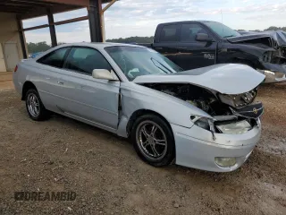 2000 Toyota Solara SE with VIN 2T1CG22PXYC398348, listed as a Copart auction lot 74207024 with 216,068 mi miles and Salvage Title. Bid and sale history available at DreamBid. Image 4.