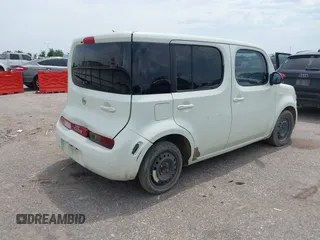 2011 Nissan Cube S with VIN JN8AZ2KR4BT208700, listed as a IAAI auction lot 42477486 with 194,818 mi miles and . Bid and sale history available at DreamBid. Image 4.