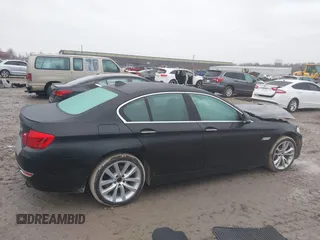 2014 BMW 5 Series 535i xDrive with VIN WBA5B3C56ED537753, listed as a IAAI auction lot 41054663 with 138,684 mi miles and . Bid and sale history available at carsss.com. Image 13.