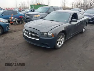 2014 Dodge Charger SE with VIN 2C3CDXBG1EH174977, listed as a IAAI auction lot 41792264 with 1 mi miles. Bid and sale history available at carsss.com. Image 2.