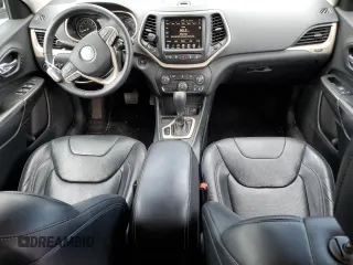 2014 Jeep Cherokee Limited with VIN 1C4PJLDS0EW148212, listed as a Copart auction lot 60464965 with 82,015 mi miles and Salvage title. Bid and sale history available at DreamBid. Image 8.
