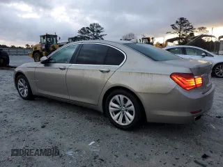 2012 BMW 7 Series 740i with VIN WBAKA4C56CDS99041, listed as a Copart auction lot 41436735 with 170,059 mi miles and Clean title. Bid and sale history available at DreamBid. Image 2.