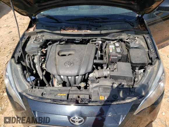 2018 Toyota Yaris with VIN 3MYDLBYV0JY326720, listed as a Copart auction lot 52027505 with 105,127 mi miles and Salvage Title. Bid and sale history available at DreamBid. Image 12.