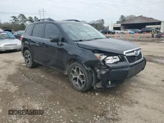 2014 Subaru Forester XT Touring with VIN JF2SJGMC2EH534565, listed as a Copart auction lot 44773305 with 142,537 mi miles and Salvage Title. Bid and sale history available at DreamBid. Image 4.