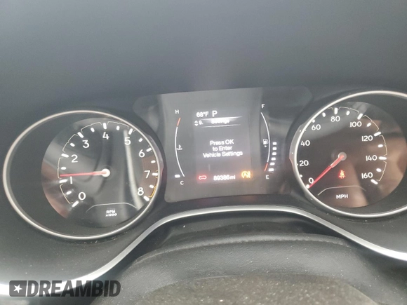 2020 Jeep Compass Sport z VIN 3C4NJCAB9LT246900, wystawiony jako Copart lot #60553325 z przebiegiem 89 386 mil mil oraz Szkoda całkowita • Salvage title. Historia ofert i sprzedaży dostępna na DreamBid. Obrazek 9.